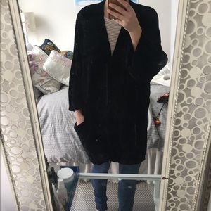 Oversized black Anthropologie sweater.